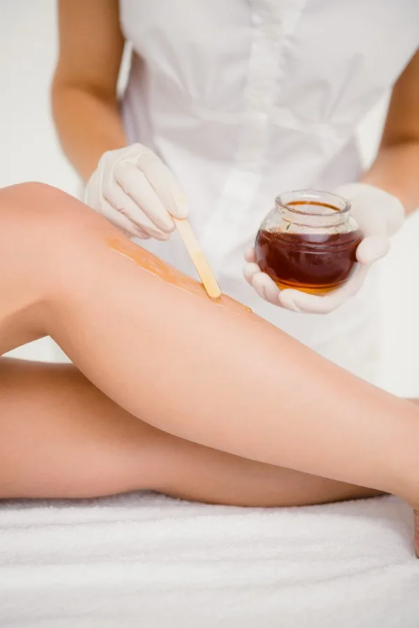 Professional waxing treatment being applied at Rêve Skincare